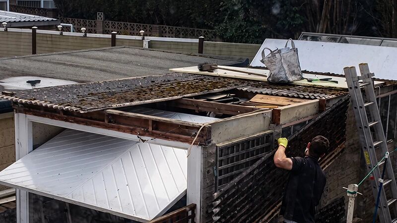 Asbestos garage roof removal by licensed UK contractors