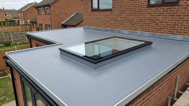 Flat roof extension with a new glass skylight rooflight